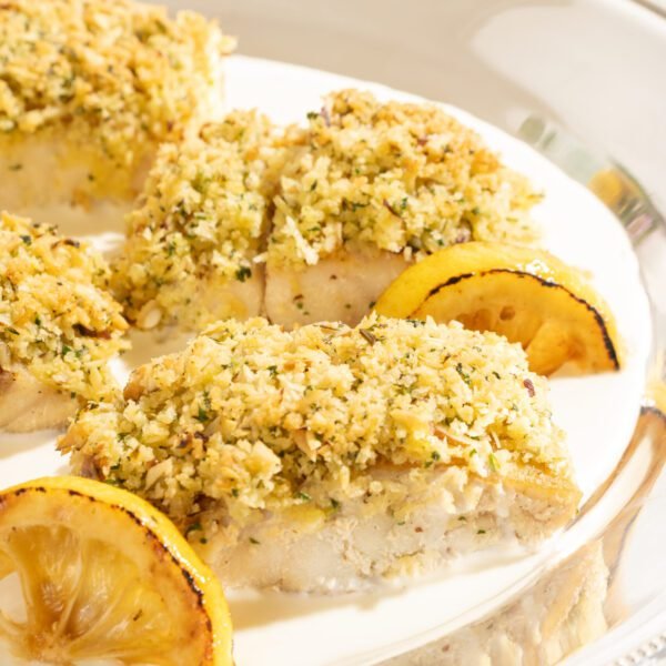 Robalo em crosta de castanha do pará e molho veluté de limão siciliano